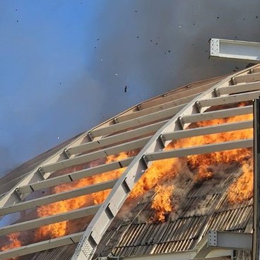 Fire affecting the Universal Hall roof structure in April 2024